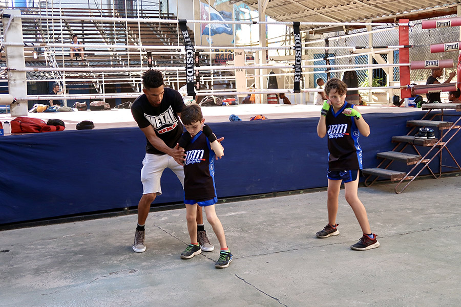 Learning traditional boxing stance during lessons at Rafael Trejo Gym