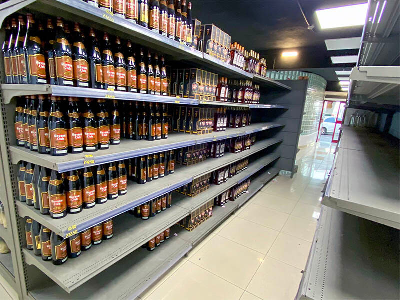 Shelves of rum in Havana, Cuba