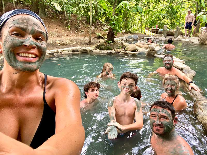 Fmaily photo of us wearing mud masks at Eco Termales