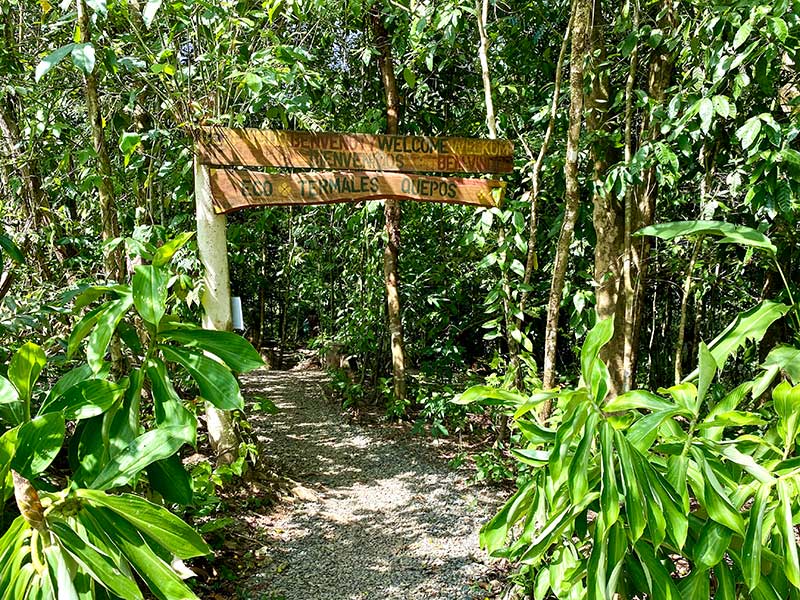 Welcome sign at the trail entrance to Eco Termales Quepos