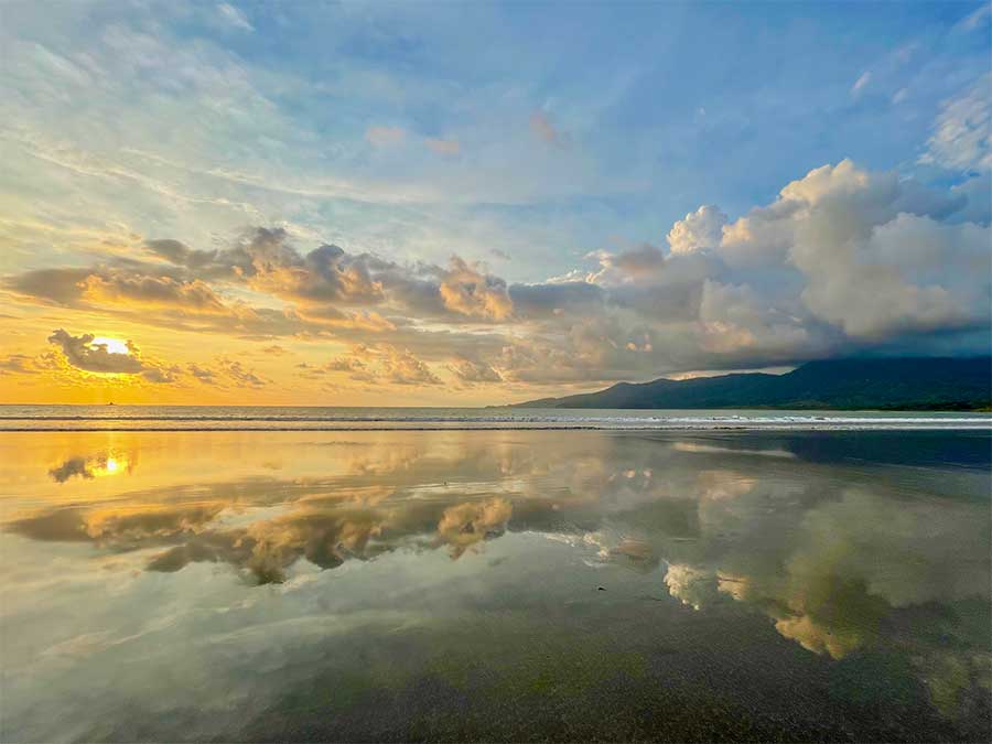 Suset reflection on the shallow water at Marino Ballena, Uvita, Costa Rica
